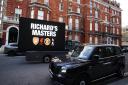 A protest sign baring the name of Chief Executive of the Premier League Richard Masters, ahead of the Premier League Shareholders Meeting in London.