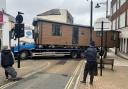 Delays after static caravan collides with lamppost and blocks High Street