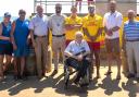 Paralympian Andy Cassell, Olympian Richard Jefferies, Sandown mayor Cllr Alex Lightfoot and lifeguards at the opening of Sandown's new £100k  Changing Places beach facility.