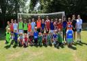 Mille Tinsley and Jess Green with participants of the two-day football camp