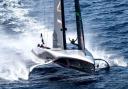 Britannia celebrate winning the Louis Vuitton Cup, to book their place in the 37th Americas Cup final against New Zealand on October 12.