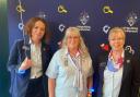 Angela, centre, is pictured at the Girlguiding event with chief guide Tracy Foster, right, and deputy chief guide Sally Kettle