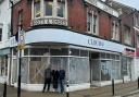 From right: Ray Redrup, managing director of Grace's Bakery, and his children Sarah and David outside 40 High Street, the new location for Grace's Bakery in Newport.