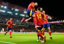 Spain’s Aymeric Laporte, centre, headed Spain into an early lead against Nations League rivals Serbia (Jose Breton/AP)