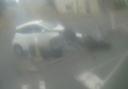 CCTV captures moment car crashes into motorbike