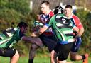 Michael Barrett (with the ball) scored two tries as the Hurricanes romped to victory