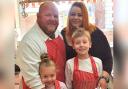 Island butcher Des Jarvis and his family.