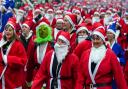 Participants taking part in the Liverpool Santa Dash in Liverpool in aid of Alder Hey Children's Hospital.