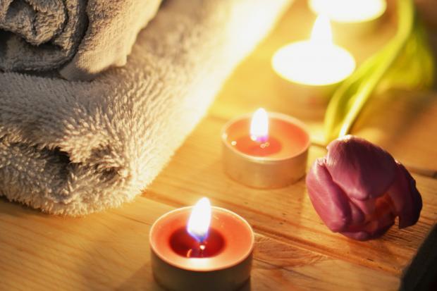 Isle of Wight County Press: A pile of towels, candles and a tulip. Credit: Canva