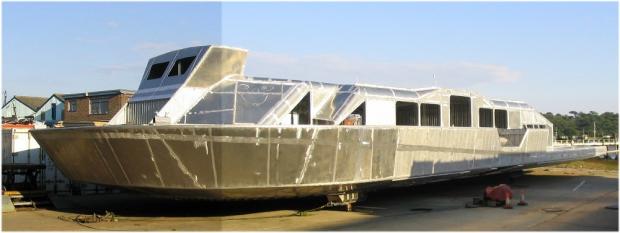 Isle of Wight County Press: The unidentified hovercraft at Ryde is actually one of the BHT130 hovercraft designed and built by Hoverwork at their St Helens works before the company was merged with Griffon. Photo: Tony Barton.