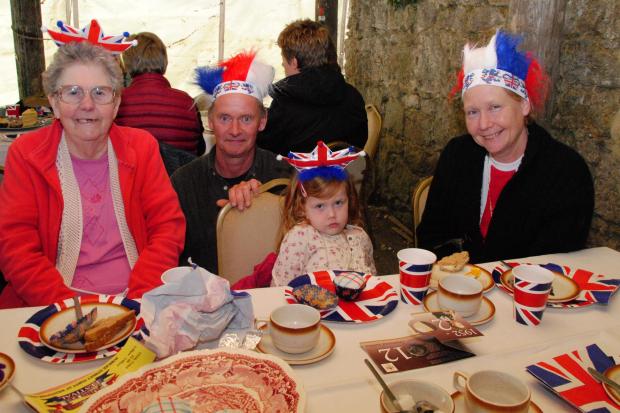 Diamond Jubilee 2012. Jubilee party at Westover House, Calbourne. From left, Eileen Perkins, Andy Lambert, Grace Mobley four and Sandra Mobley. Photo: IWCP Archive.