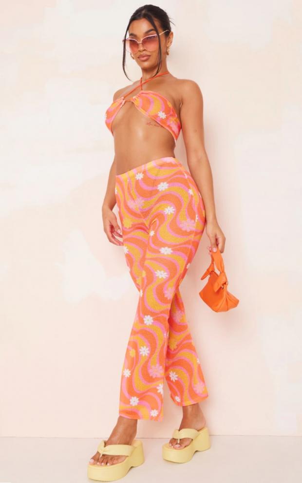 Isle of Wight County Press: Orange Flower Swirl Print Knit Flare Trousers (PrettyLittleThing)