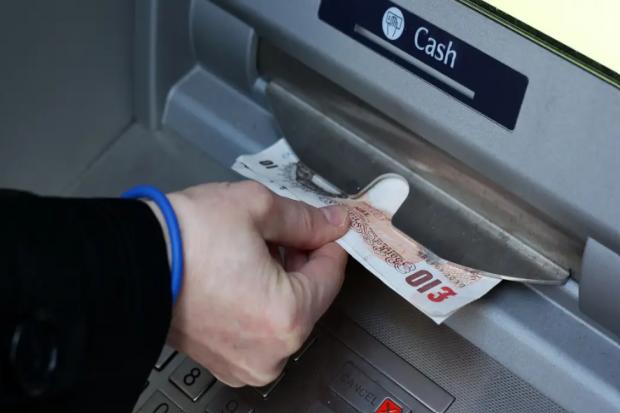 ATM scam: Police warning as Brits see cash withdrawn for their accounts . (PA)