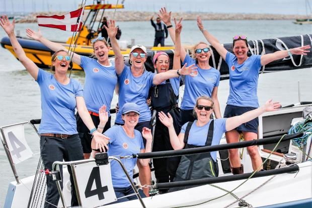 Isle of Wight County Press: The all-female crew on board Nightjar celebrate Women's Day at Cowes Week. Photo: Paul Wyeth 