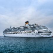 A cruise ship sailing in the sea. Credit: Canva