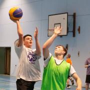 Gabriel Scuderi of Ryde Revenants driving to the basket for a layup.