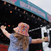 A young fan at Scouting for Girls at the Isle of Wight Festival Main Stage on Saturday