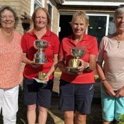 Westridge ladies, Viv Tomlinson and Sally Hardy, with their silverware, joined by Joan Martin and Lynne Maidment.