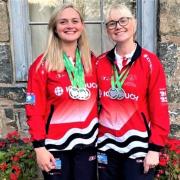 Shooting sisters Shelley Sprack and Imogen Reed added to their medal haul in Guernsey with team silver in the ISSF 25m sport pistol team final.