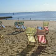 Deckchairs on the beach.