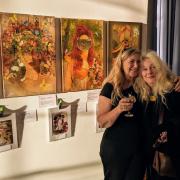 Dawn Fidler of Monkton Arts with artist Mia Sewell, right, and some of her work on display.