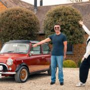 Simon Cowell and Nicki Shields with an all-electric Mini eMastered.