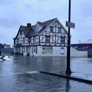 Flooding at Well Road roundabout in East Cowes last year.