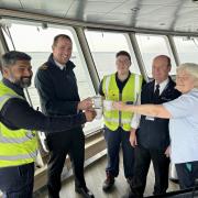 From left: Senior rating, Venson Da Silva, captain, Andy Grocott, rating, Emily Joss, deck mate, Dave McCoubrie and senior steward Tracy Ford toast Wightlink’s gold in the British Travel Awards.
