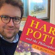 Hansons books expert Jim Spencer with the Harry Potter first edition