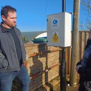 Cllr Ed Blake and David Groocock with some of the existing monitoring equipment on Leeson Road