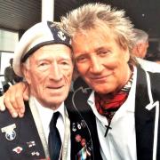 Alec Penstone with Rod Stewart at a past D-Day event in Normandy.