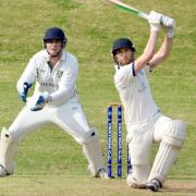 Henry Barttlett of Ventnor hits out against Sarisbury Athletic.