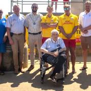 Paralympian Andy Cassell, Olympian Richard Jefferies, Sandown mayor Cllr Alex Lightfoot and lifeguards at the opening of Sandown's new £100k  Changing Places beach facility.