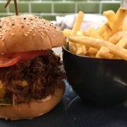 A burger enjoyed by food reviewers Matt and Cat.