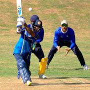 Dineth Thimodya smashes one down the ground against Portsmouth.