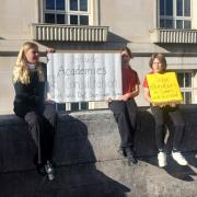 Protesters were gathered outside County Hall as the Cabinet meeting started.