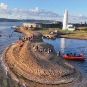 Drone shot above the Solent Swim 2024 participants at Hurst Castle