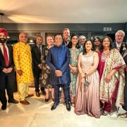 Rajesh Patel, third from left, and guests at his party on Friday night