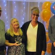 Laura Groves Award winner, Jade Harrison, with headteacher Jane Wilford presented by Steve Groves and Peter Groves