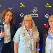 Angela, centre, is pictured at the Girlguiding event with chief guide Tracy Foster, right, and deputy chief guide Sally Kettle