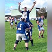 Ventnor seconds' Jack Gilbey being hoisted in the line pout against Fareham Heathens II.