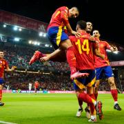 Spain’s Aymeric Laporte, centre, headed Spain into an early lead against Nations League rivals Serbia (Jose Breton/AP)