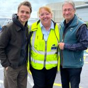 Joe Sugg, left, and Alan Titchmarsh with a delighted member of Wightlink staff.