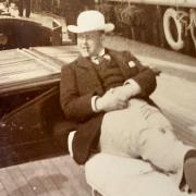 Winston Churchill, cigar in mouth, relaxing on the Oceana yacht off Cowes