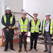 JD Viette (project manager for Aspire), John Prickett, Trevor Nicholas and Councillor Phil Jordan at Aspire where new housing units are being created