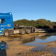 Low loader in the car park at Bembridge Point