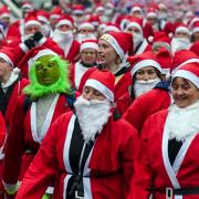 Participants taking part in the Liverpool Santa Dash in Liverpool in aid of Alder Hey Children's Hospital.