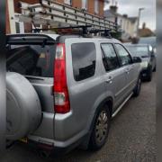 Silver Honda CR-V seized by police