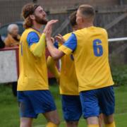 Newport celebrating away at Whitchurch United