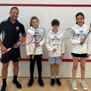 Finn Husson, Olivia Holbrook and Millie Holbrook with their coach Adam Dominey